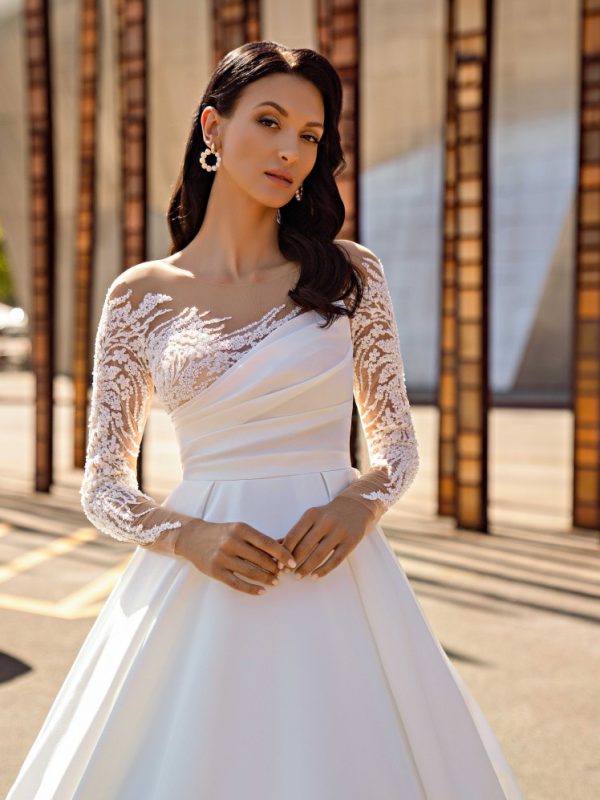 Εξαιρετικό νυφικό φόρεμα στο ένα ώμο υπέροχη δαντέλα.